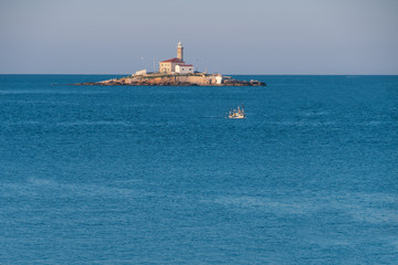 Lighthouse on a tiny island Sveti Ivan near Rovinj, Croatia