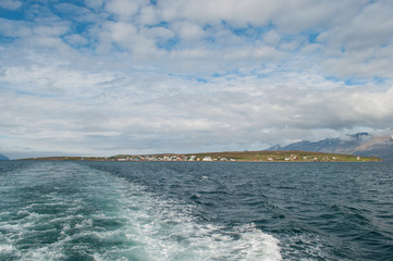 sailing away from island of Hrisey in Iceland