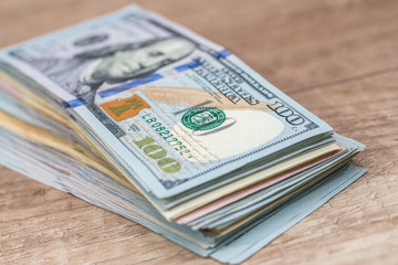 100 american dollar banknote on desk close up.