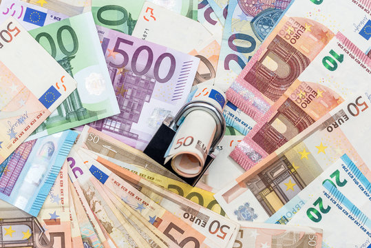 money security concept - euro banknote and padlock