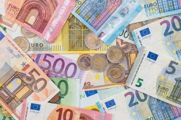 Fototapeta na wymiar mix money euro coins and banknotes. close up