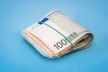 100 one hundred euro banknote isolated on blue background