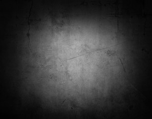 Dark grungy textured empty black concrete stone background. Dark edges 