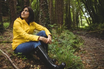 Woman relaxing in forest