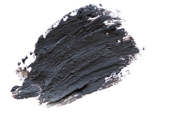 Black volcanic cosmetic clay texture close up. solution of cosmetic clay abstract background