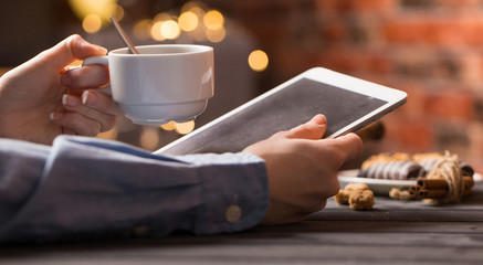 hot black coffee with cookies and beans in cafe