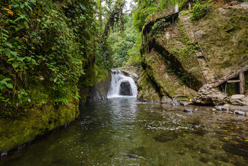 Naklejka premium Waterfall of Nambillo river, Mindo rain forest, Ecuador