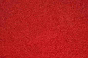 Red felt table surface extremal close up