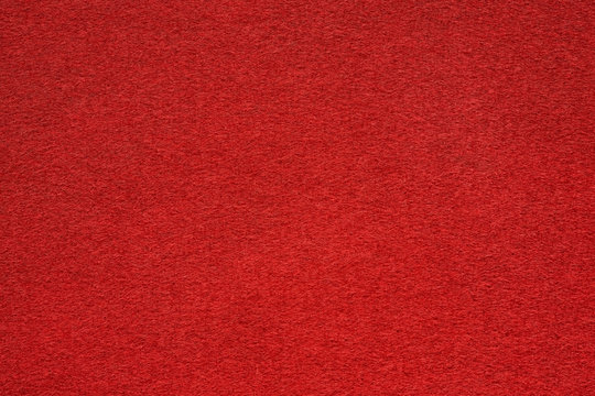 Red felt table surface extremal close up