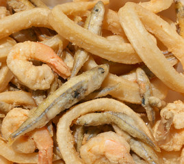 Frying fish with shrimp and squid in the restaurant