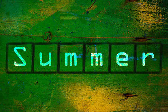 Summer writen on a wall background