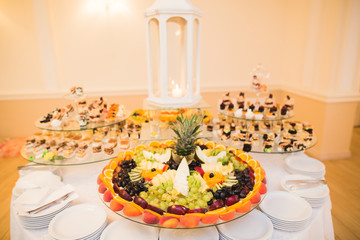 Different kinds of baked sweets on a buffet