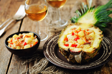 Bacon chicken pine apple vegetables fried rice in pineapples