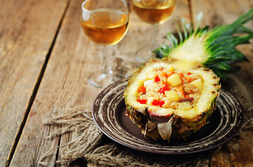 Bacon chicken pine apple vegetables fried rice in pineapples
