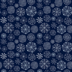 Snowflakes seamless pattern. Dark winter background. Christmas and New Year design wrapping paper design.
