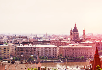 Fototapeta premium Budapest, Hungary. Beautiful panoramic view of Budapest. View of the St. Stephen's Basilica. Image filtered with cross processed.