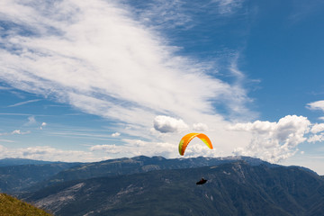 Paragliding in the sky over the dolomites
