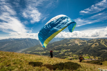 Paragliding in the sky over the dolomites