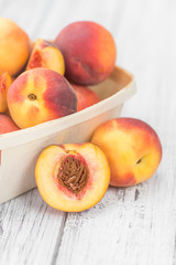 Fototapeta na wymiar Portion of Fresh Peaches, selective focus