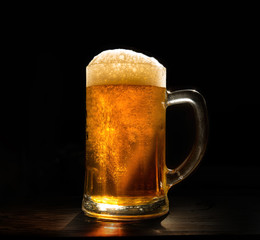 A glass of fresh, cold beer