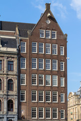 Fototapeta premium Traditional old buildings in Amsterdam