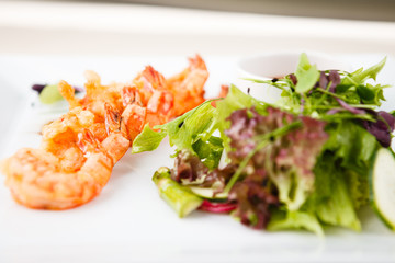 Tempura shrimps with salad