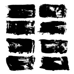 Abstract big thick black long textured brush strokes isolated on a white background