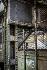 Metal support for overhead subway track