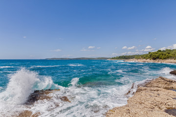 Rocky shore of the Adriatic sea after storm