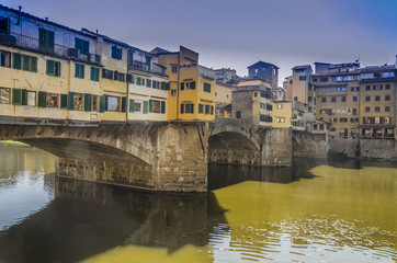 Fototapeta na wymiar parallel look of ponte vecchio in the afternoon