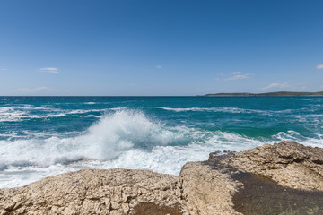 Rocky shore of the Adriatic sea after storm