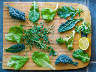 Leafy greens on cutting board