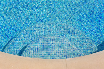 Fototapeta na wymiar Swimming pool, Close up, With blue water.