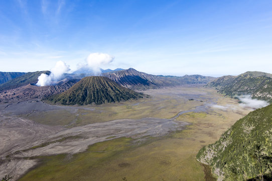 View of Mts. Bromo, Semeru, Batok and Widodaren under the blue sky in Bromo Tengger Semeru National Park, East Java, Indonesia