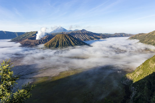 View of Mts. Bromo, Semeru, Batok and Widodaren under the blue sky in Bromo Tengger Semeru National Park, East Java, Indonesia