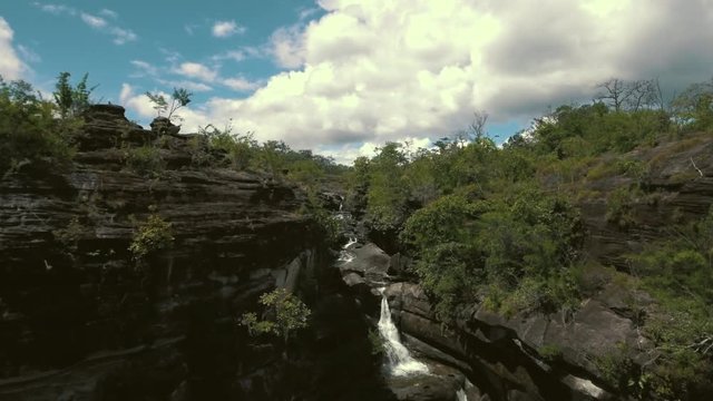 aerial shot of big waterfall in jungle