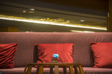 Luxury sofas in the hotel's guest lounge with night lighting.