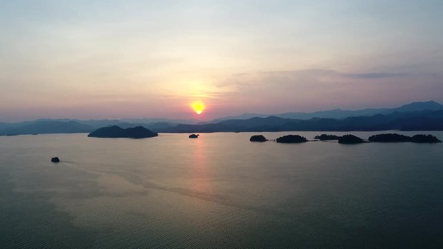 aerial shot of hangzhou thousand island lake in sunset, China