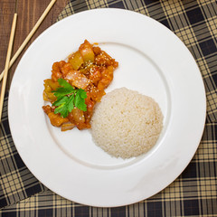 lunch: meat in sweet and sour sauce and rice, top view