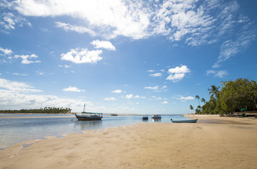 Fototapeta na wymiar Tropical island beach and boats