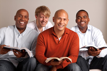 Diverse group of men studying together.