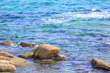 Fototapeta premium Stone beach of the Sea at summer day 