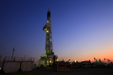 Oil drilling platform in the beautiful night