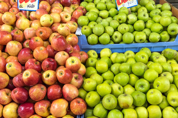 Fresh red and green apples for sale at a market