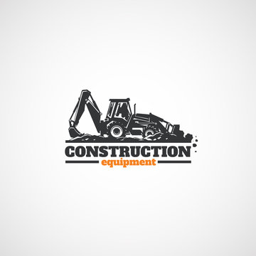 Construction Tractor excavator and Stones in the bucket.