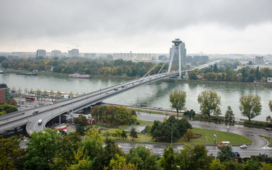 Fototapeta na wymiar Most SNP on a cloudy day in Bratislava, Slovakia