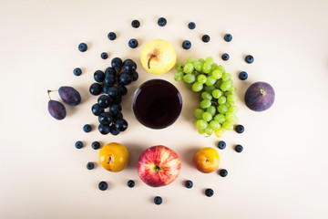 Grape juice with autumn seasonal fruits.