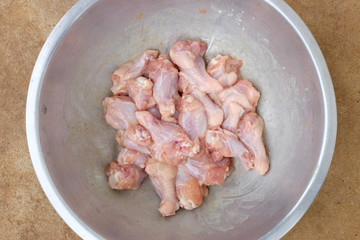 Raw chicken wings prepare for cooking.