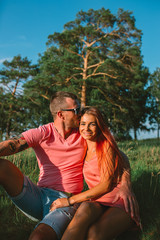 Smiling couple in love, outdoors, having joyful moment together