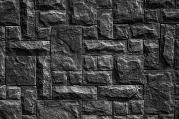 pattern of black stone wall